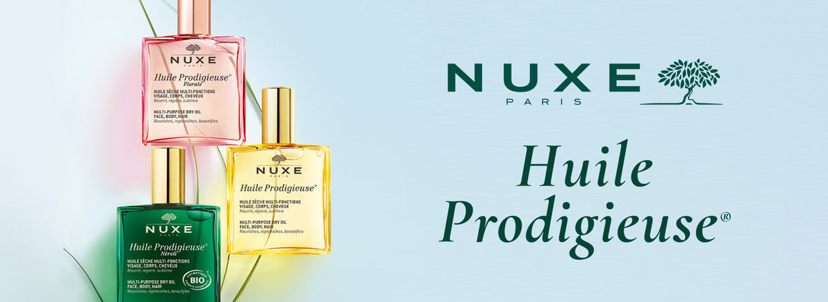 NUXEの赤、黄色、緑の商品がそれぞれ置かれている